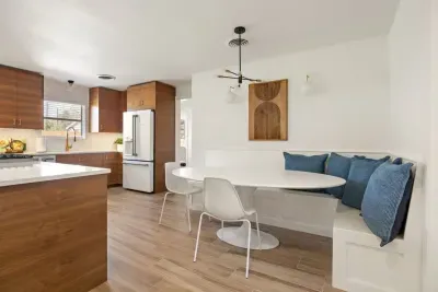 A spacious dining area where everyone can come together to eat and connect.