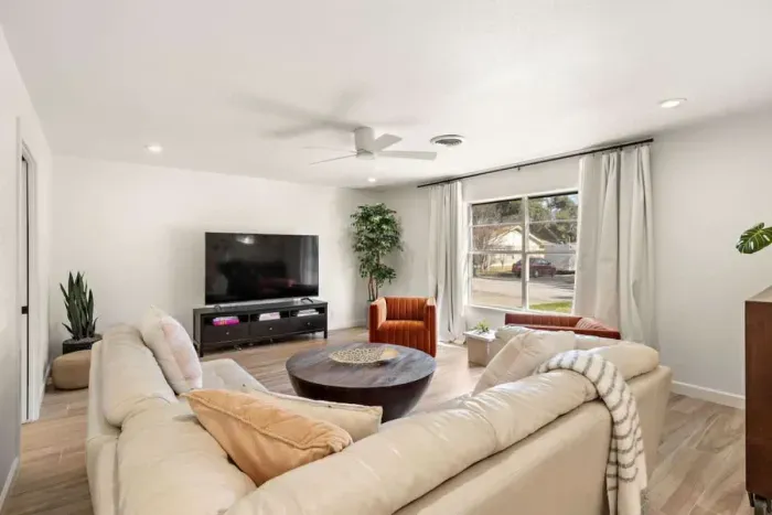 Bright and cozy living room with comfortable seating for everyone.