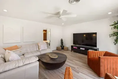 Spacious living area with comfortable couches, perfect for gathering with friends and family.