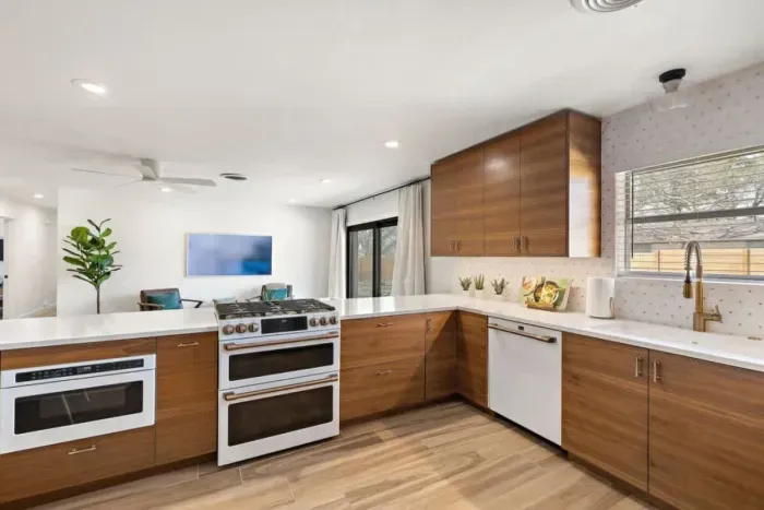 Experience the elegance of a full modern kitchen, complete with sleek cabinetry, state-of-the-art appliances, and stylish finishes. Designed for both functionality and aesthetic appeal, this kitchen is perfect for cooking, entertaining, and making la