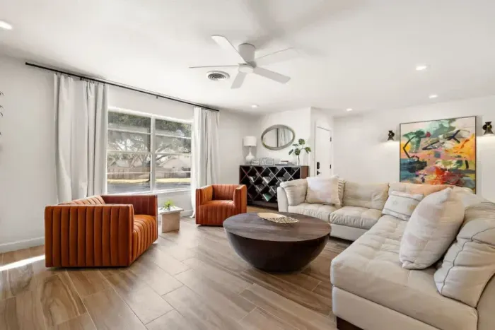 Mimosa House offers a variety of living areas, ensuring every guest can enjoy personalized relaxation, whether it's unwinding solo with a favorite show or engaging in group conversations and entertainment.
