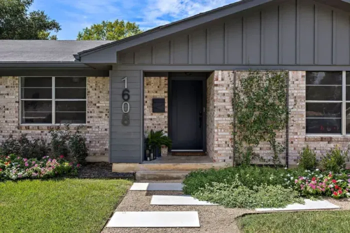 Stunning front exterior of our fully remodeled home, showcasing modern design and timeless charm. The updated façade features clean lines, fresh finishes, and welcoming curb appeal. A perfect blend of style and function, this home is ready to impress