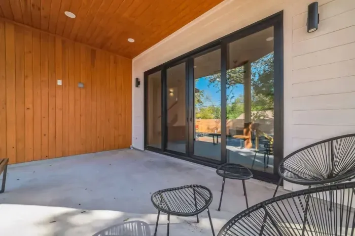 Cozy patio with comfortable seating and a peaceful atmosphere, perfect for morning coffee or evening relaxation.