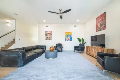 Equipped with a large TV, cozy seating, and space for everyone.