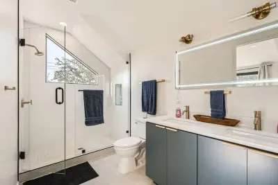 Enjoy a refreshing morning routine in a bright, beautifully designed space.