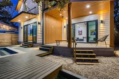 3. Inviting facade with a cozy front porch and stylish details.