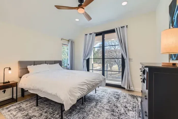 Featuring a beautifully dressed queen-size bed and natural lighting, this room is ideal for couples seeking a romantic retreat.