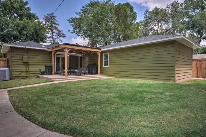Backyard view with plenty of open space and privacy.
