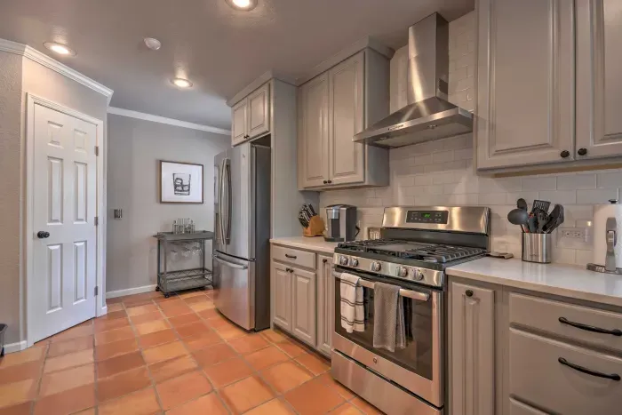 Entryway view connecting to the kitchen and living areas.
