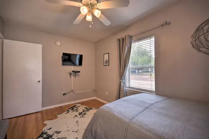 Guest bedroom with neutral tones and simple elegance.