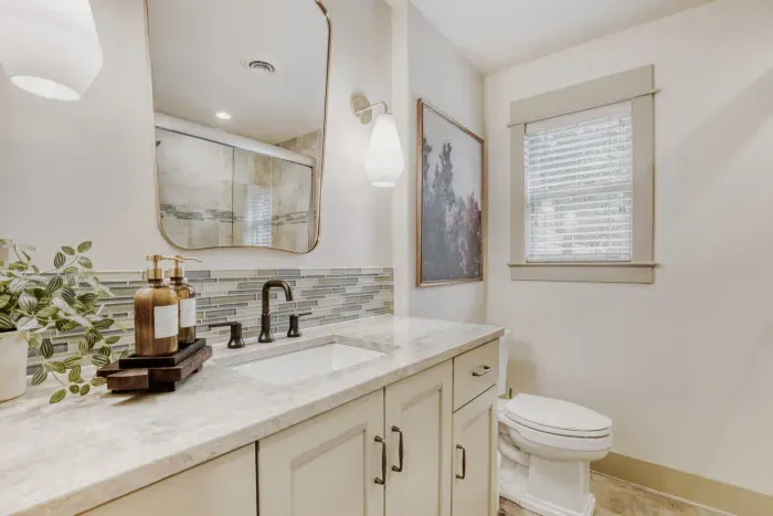Bright, clean bathroom featuring modern finishes and a fresh, functional layout