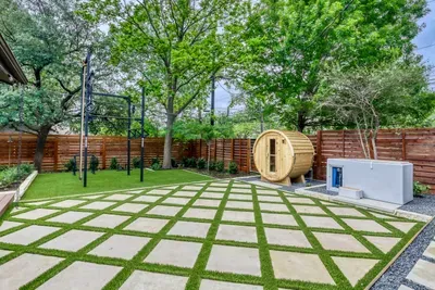 Backyard wellness meets design… private sauna, cold plunge, and a full outdoor training space