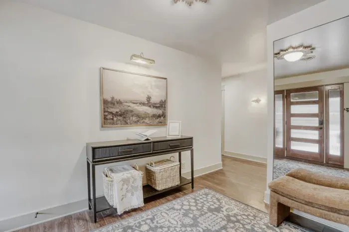Welcoming entryway with clean lines and warm finishes, setting the tone for the rest of the home