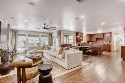Open-concept living space designed for comfort and connection, with seamless flow into the kitchen and dining area