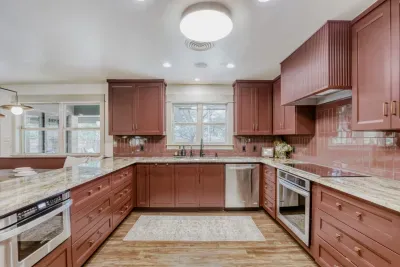 Thoughtfully designed kitchen and dining space with natural light, modern touches, and a welcoming flow