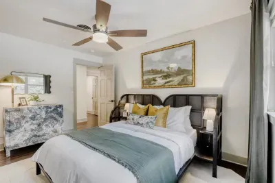 Inviting guest room with warm accents and thoughtful styling, designed for comfort and rest