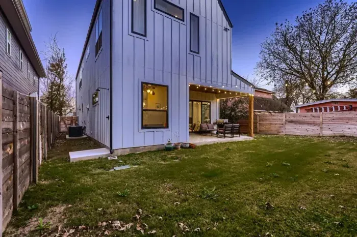 Sun-drenched backyard with plenty of seating and a stunning view for ultimate relaxation.