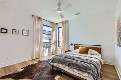 Serene bedroom with calming colors and thoughtfully chosen furnishings.