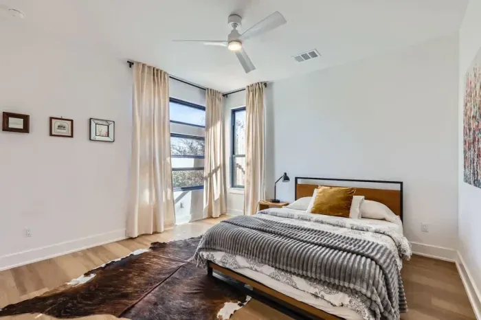 Serene bedroom with calming colors and thoughtfully chosen furnishings.