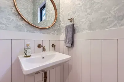 Simple yet elegant bathroom with a minimalist design and all the essentials.