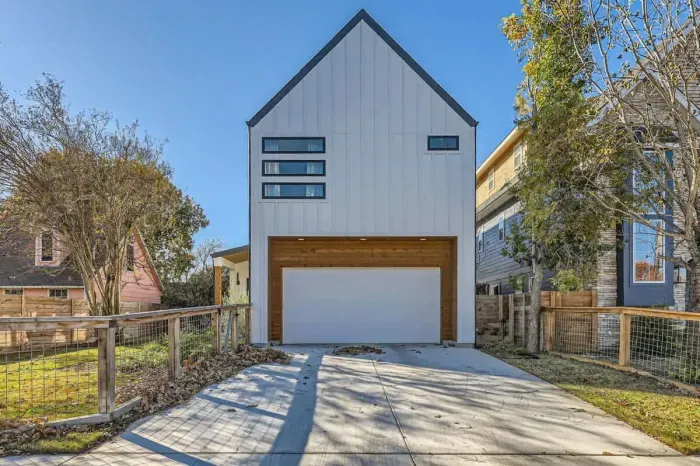 Bright and airy exterior with a mix of modern materials and natural finishes.
