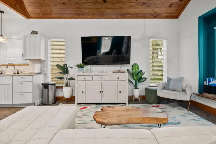 Comfortable living area with modern furnishings and smart TV entertainment.