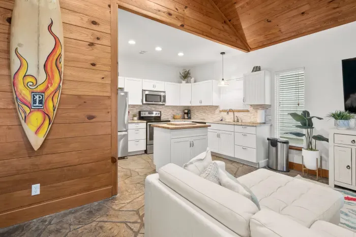 Another view of the serene living area showcasing spacious seating and warm designer finishes for ultimate comfort.