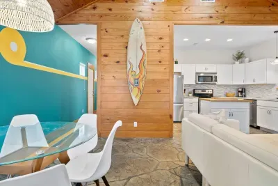 Coastal dining area perfect for family meals and relaxed conversation.