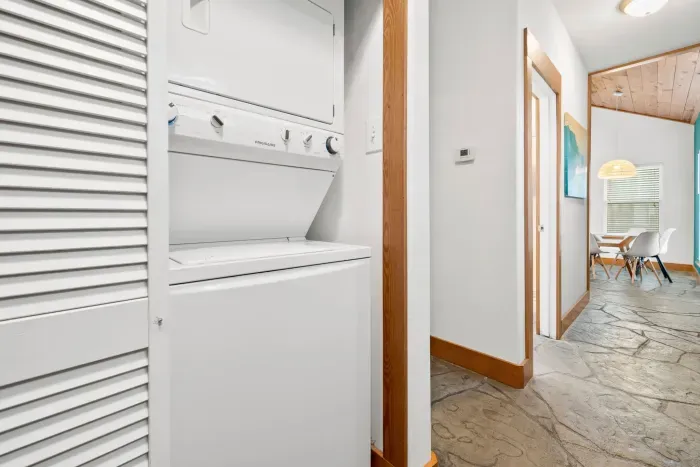 Convenient in-home laundry space for effortless vacation comfort.
