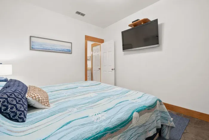 Light-filled master retreat with comfortable layout and modern touches.