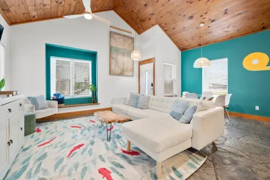 Spacious open-concept living area designed for comfort and gathering.