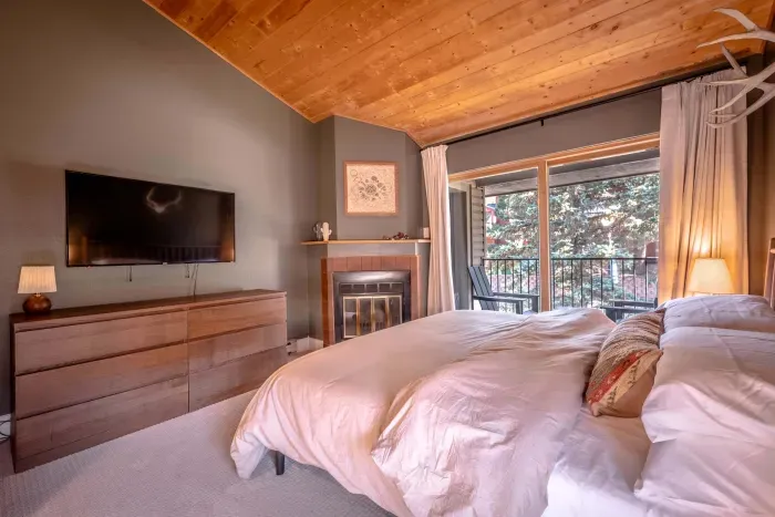 Cozy retreat with warm wood ceilings and peaceful morning light.
