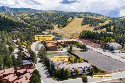 Aerial view showing easy access to nearby trails and slopes.