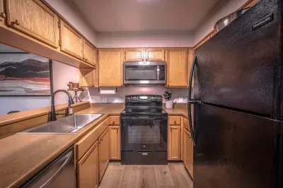 Fully equipped kitchen with spacious counters and modern appliances.