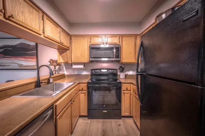 Fully equipped kitchen with spacious counters and modern appliances.