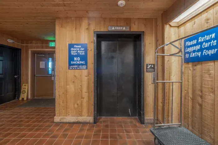 Warm and welcoming lobby with rustic mountain decor.