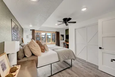 Bright guest bedroom with cozy decor.