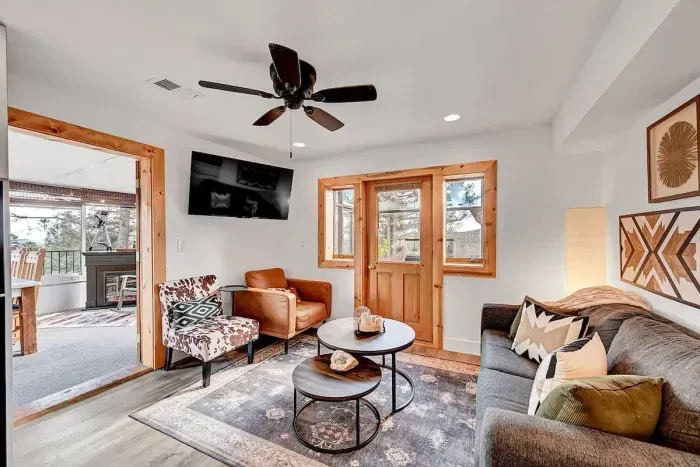 Cozy living room with mountain view and smart TV.