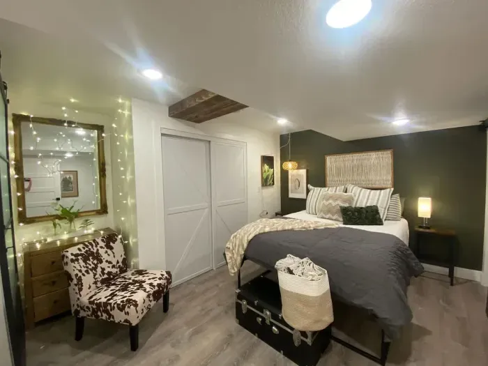 Inviting master bedroom with warm lighting.