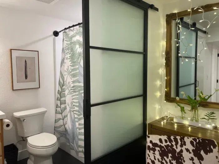 Stylish full bathroom with rustic charm