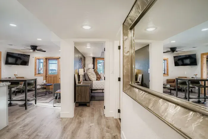 Spacious living room with open layout and rustic modern design.