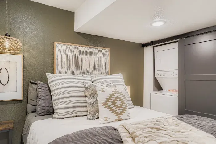 Stylish bedroom with modern accents and a peaceful atmosphere.