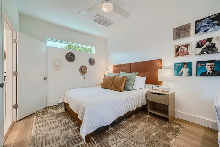 Peaceful bedroom with a plush queen-sized bed and soft linens for a restful night’s sleep.