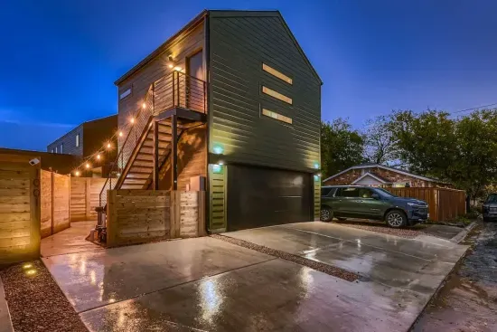 Exterior with own parking space and private entry up the stairs.