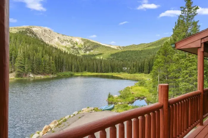Views from the balcony. Incredible views throughout the home and multiple places to take in the Mountains, Lake, Trees, and amazing Colorado weather!