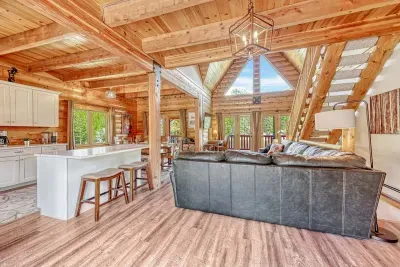 Spacious living area with comfortable couches, perfect for gathering with friends and family.