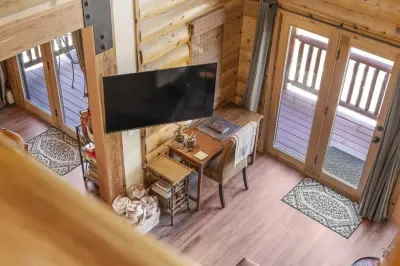 Make use of the convenient desk space in the living room, perfect for remote work or study. This functional area blends seamlessly with the living space, allowing you to stay productive while enjoying the comfort of the main room
