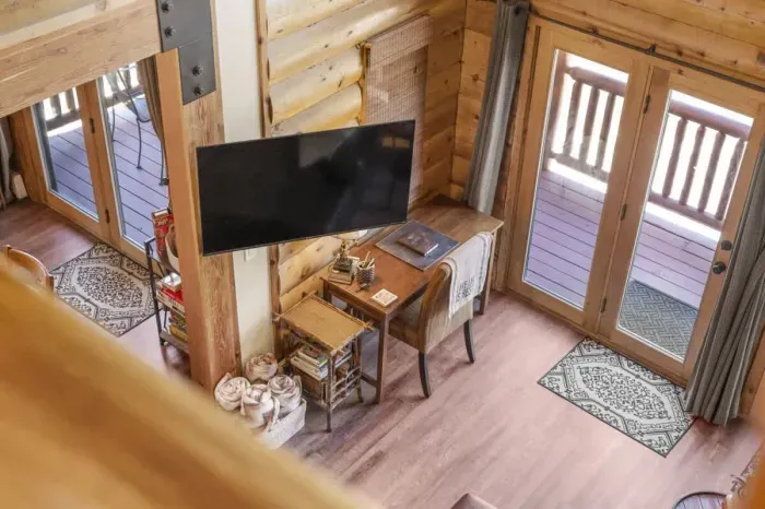 Make use of the convenient desk space in the living room, perfect for remote work or study. This functional area blends seamlessly with the living space, allowing you to stay productive while enjoying the comfort of the main room