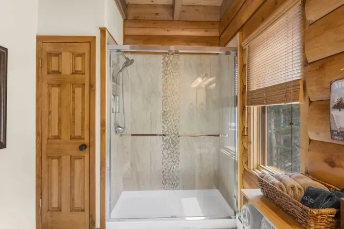 A refreshing, clean bathroom with charming decor and all the essentials.