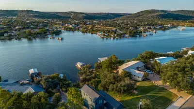 Scenic aerial view of the property and surrounding area.